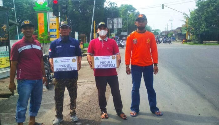PEDULI KORBAN GUNUNG SEMERU ANSOR PAC PUNGGING TURUN KE JALAN 1 SORBANSANTRI.COM
